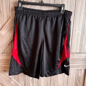 Nike Men's Black Athletic Shorts with Red Accents